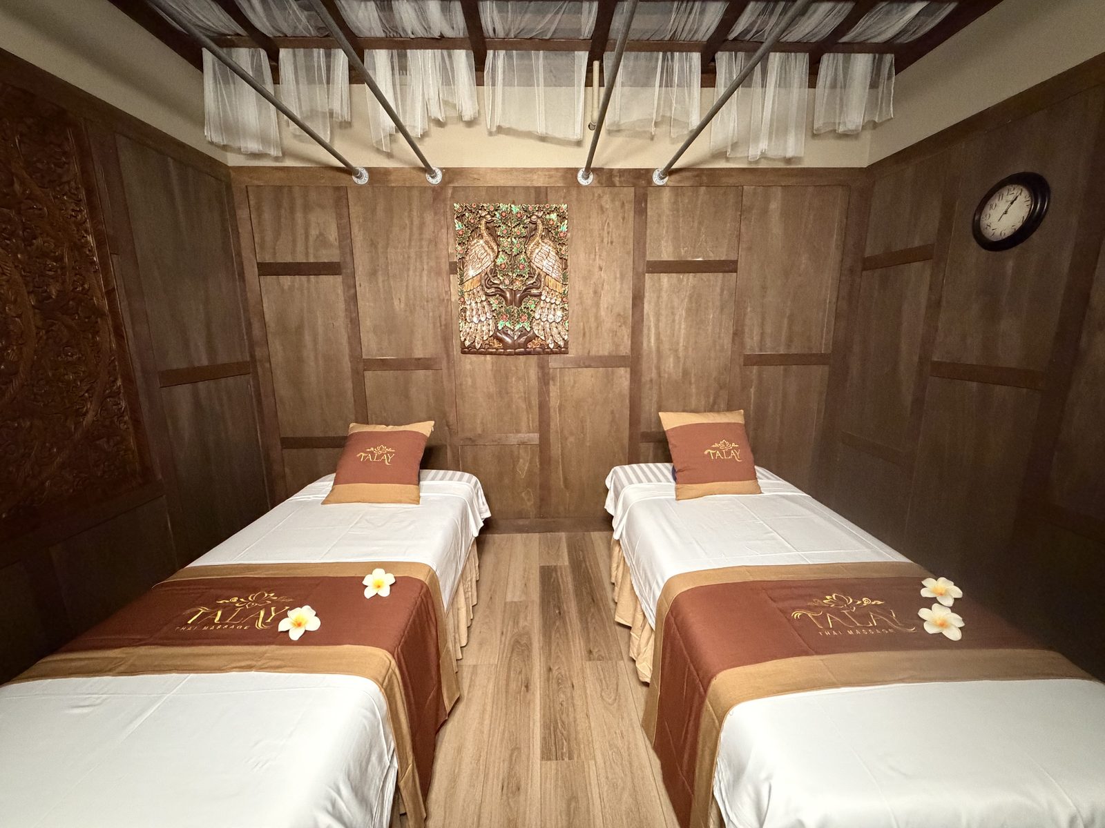 Couple's massage room with two beds